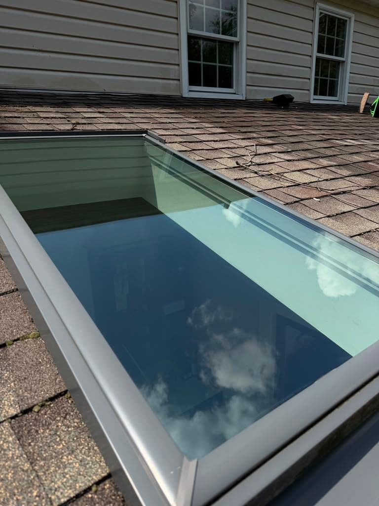 The same skylight fully cleaned and reflecting clear sky after skylight cleaning